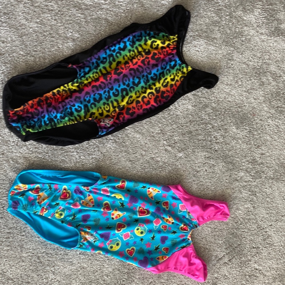 TWO GYMNASTICS CHILD MEDIUM LEOTARDS